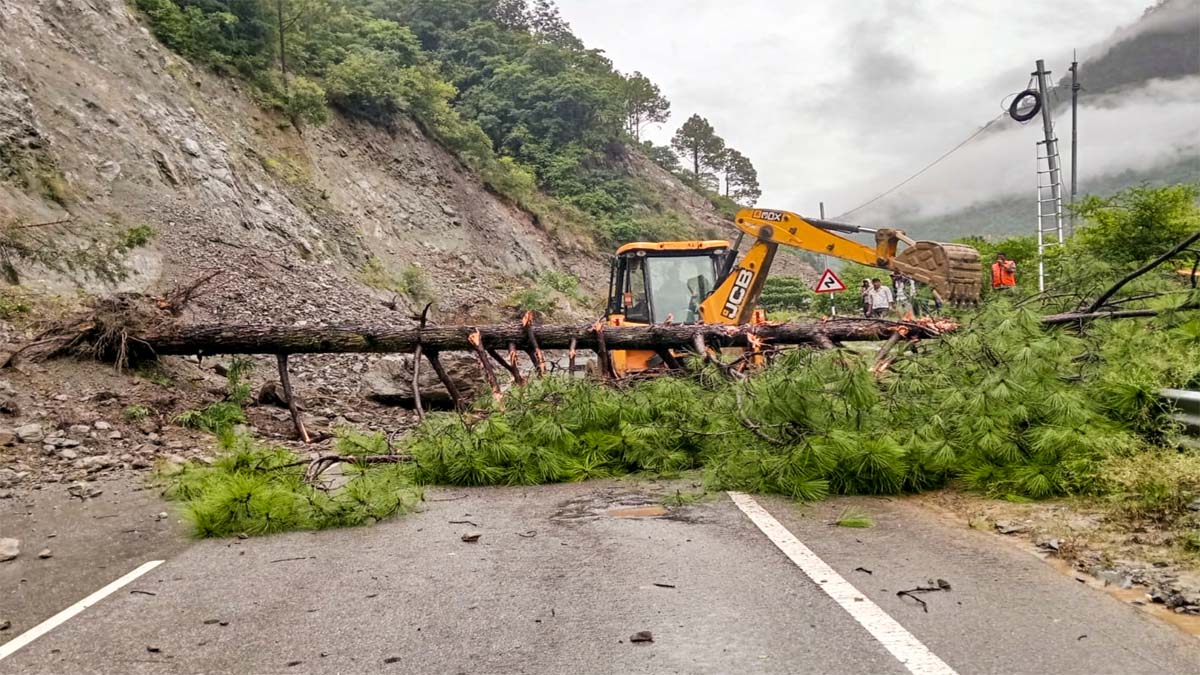 Restoration work underway at a disaster-hit area, in Uttarkashi (PTI Photo)