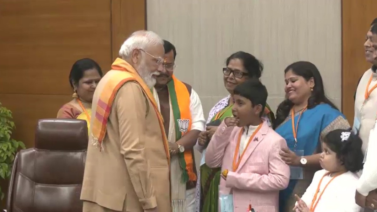 PM Modi fed sweets to Nitin Navin.