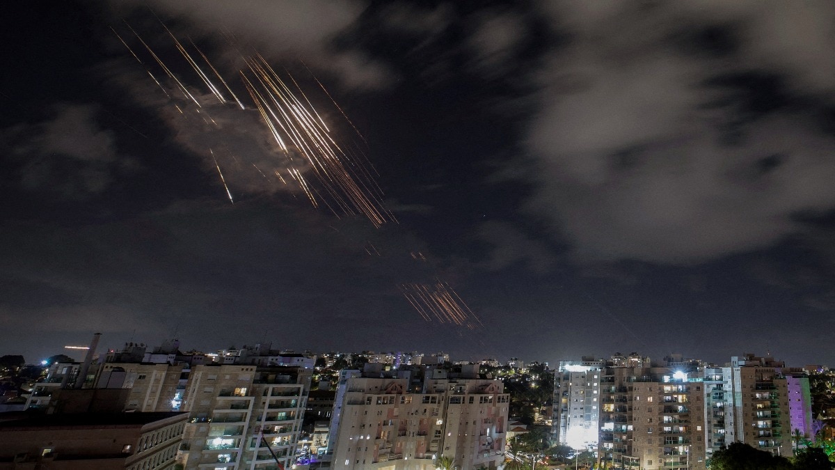  Israel's Iron Dome anti-missile system intercepts rockets after Iran fired a salvo of ballistic missiles. (Reuters)