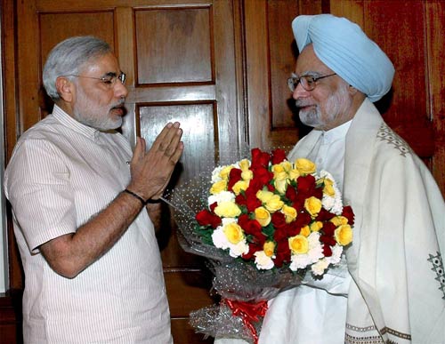 मनमोहन से मिले मोदी