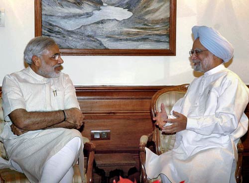 मनमोहन से मिले मोदी