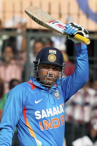 तस्वीरों में देखें सहवाग ने कैसे लगाया दोहरा शतक