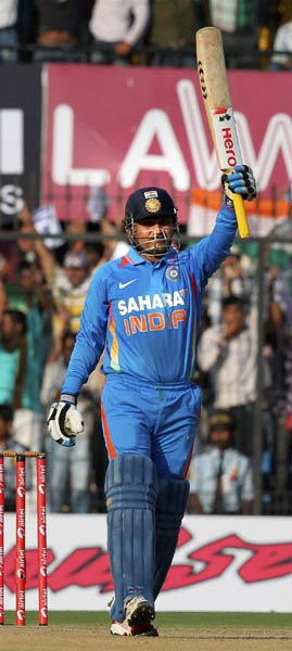 तस्वीरों में देखें सहवाग ने कैसे लगाया दोहरा शतक