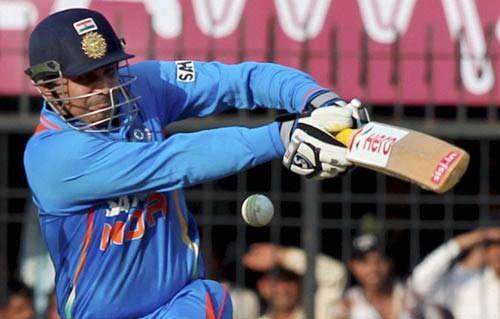 तस्वीरों में देखें सहवाग ने कैसे लगाया दोहरा शतक