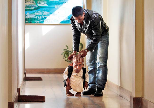 दुनिया के सबसे बौने आदमी की तस्‍वीरें