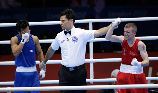 लंदन ओलंपिक: 12वें दिन की खास तस्‍वीरें