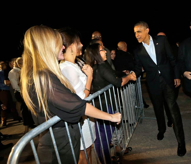 तूफान ने रोका ओबामा, रोमनी का चुनावी अभियान