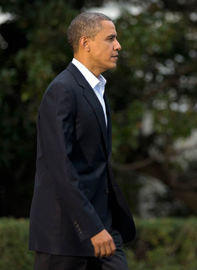 तूफान ने रोका ओबामा, रोमनी का चुनावी अभियान