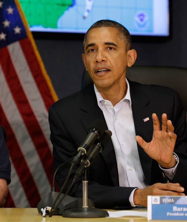 तूफान ने रोका ओबामा, रोमनी का चुनावी अभियान