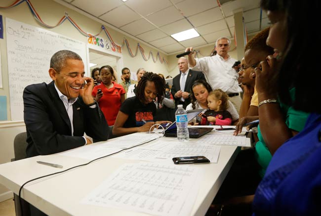 तूफान ने रोका ओबामा, रोमनी का चुनावी अभियान