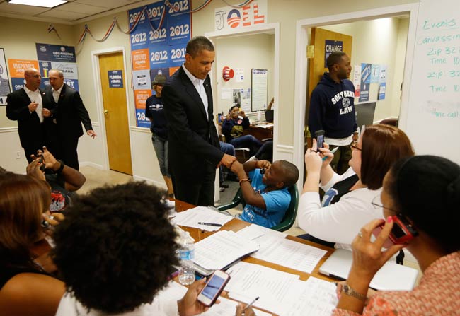 तूफान ने रोका ओबामा, रोमनी का चुनावी अभियान