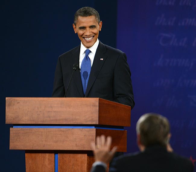 आर्थिक नीतियों पर ओबामा, रोमनी में जोरदार बहस