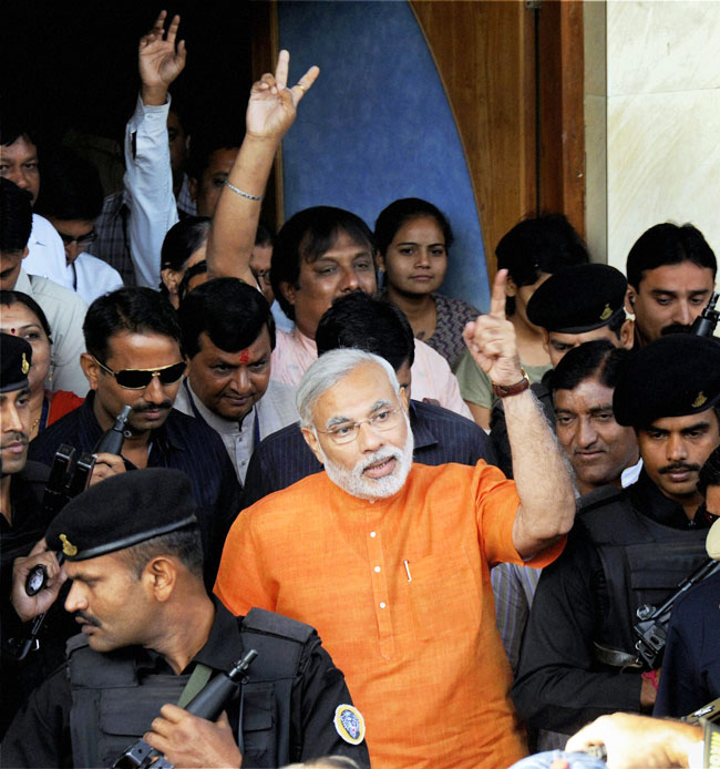 देखें गुजरात विधानसभा चुनाव के आखिरी दौर के मतदान की तस्वीरें