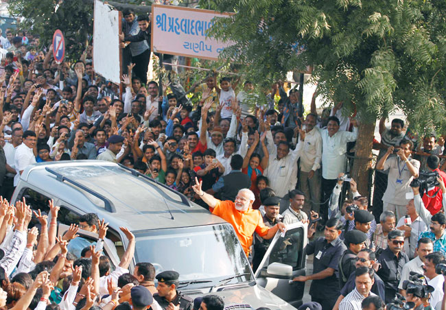 देखें गुजरात विधानसभा चुनाव के आखिरी दौर के मतदान की तस्वीरें