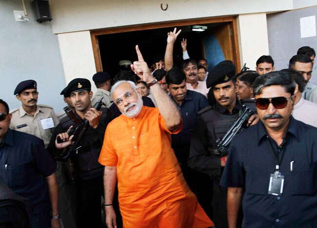 देखें गुजरात विधानसभा चुनाव के आखिरी दौर के मतदान की तस्वीरें