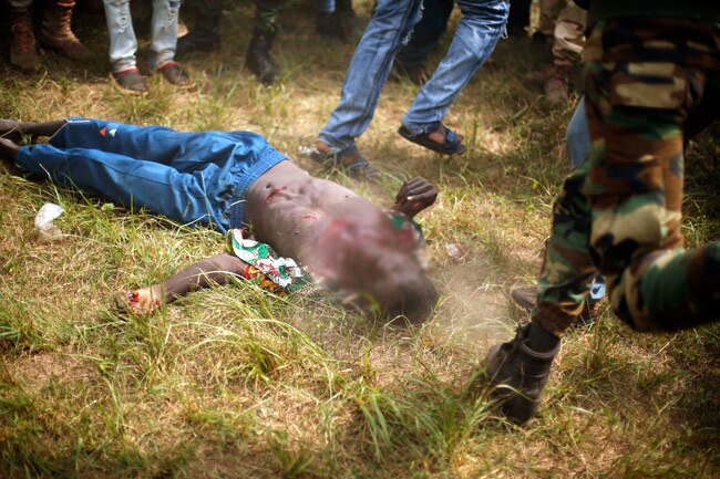 पत्थरों से कुचला, लाशों में घोंपे चाकू: शर्मनाक तस्वीरें