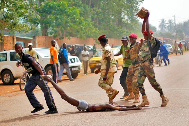 पत्थरों से कुचला, लाशों में घोंपे चाकू: शर्मनाक तस्वीरें