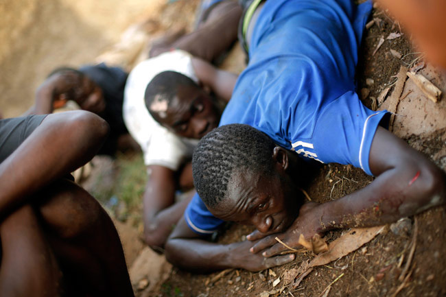 पत्थरों से कुचला, लाशों में घोंपे चाकू: शर्मनाक तस्वीरें