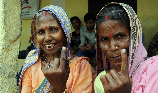 तस्वीरों में देखिए असम और त्रिपुरा का मतदान