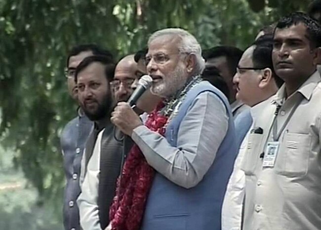 भारत के भावी प्रधानमंत्री नरेंद्र मोदी का नई दिल्‍ली में भव्‍य स्‍वागत