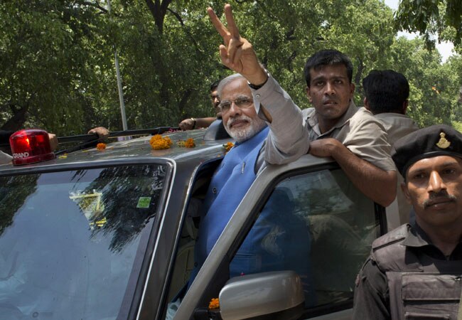 भारत के भावी प्रधानमंत्री नरेंद्र मोदी का नई दिल्‍ली में भव्‍य स्‍वागत