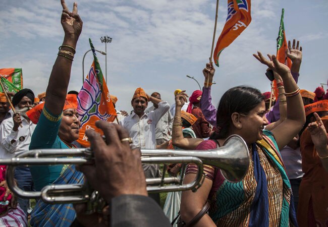 भारत के भावी प्रधानमंत्री नरेंद्र मोदी का नई दिल्‍ली में भव्‍य स्‍वागत