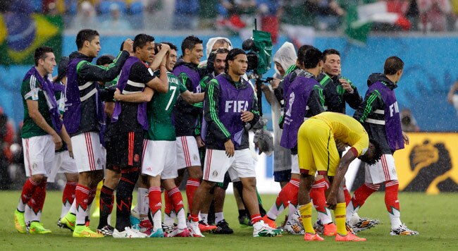FIFA WC 2014: तस्वीरों में मेक्सिको और कैमरून का शानदार मैच...