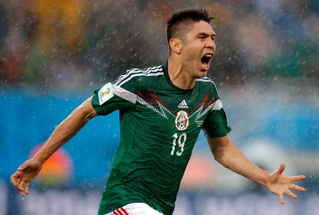 FIFA WC 2014: तस्वीरों में मेक्सिको और कैमरून का शानदार मैच...