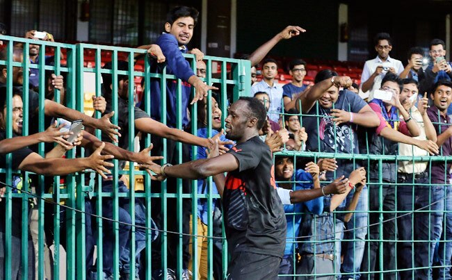 क्रिकेट में बोल्ट ने दिया युवी को 'झटका' तो 100 मीटर में जीते युवराज