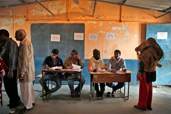 तस्वीरें: मतदान के दिन कैसा रहा दिल्ली का जोश