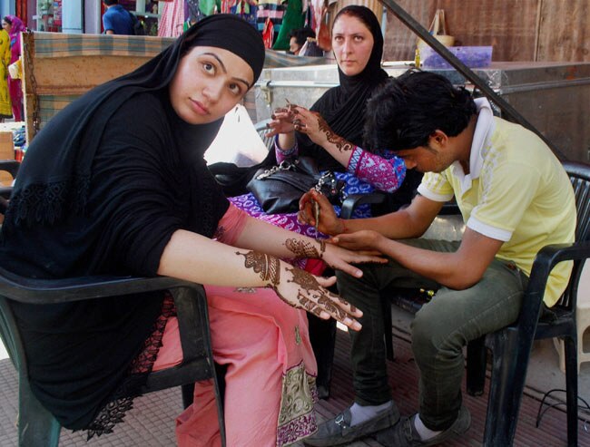 तस्वीरें: दुनियाभर में ईद की रौनक