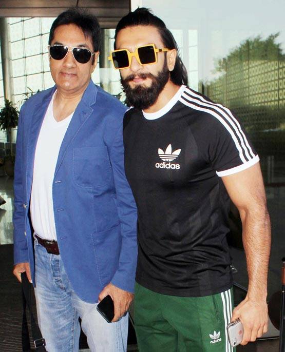 काला चश्मा लगाए एक ही जगह नजर आए रणवीर और कपिल शर्मा