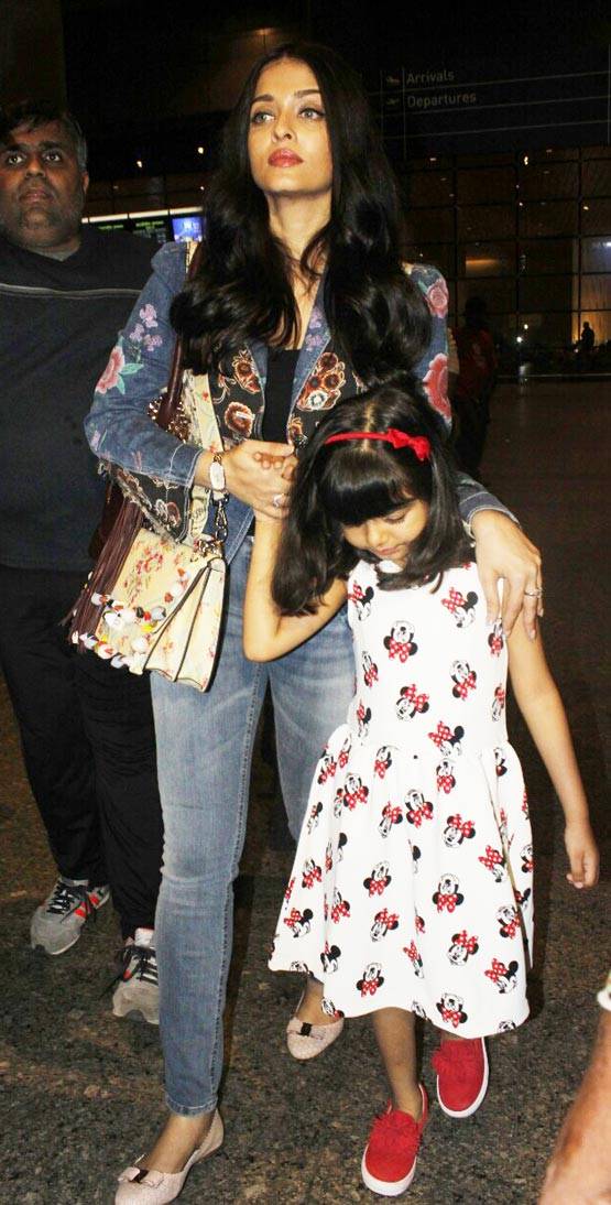बेटी के साथ Cannes से लौटीं ऐश्वर्या, देखें PHOTOS...