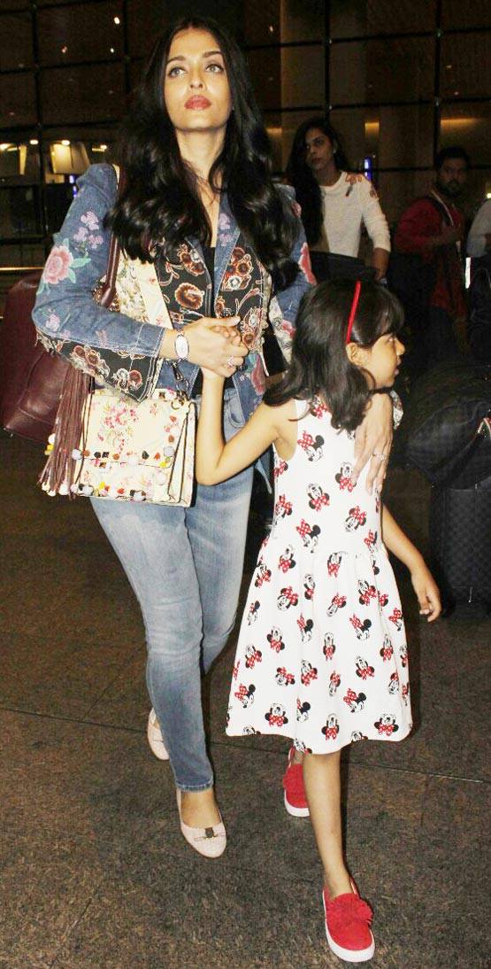 बेटी के साथ Cannes से लौटीं ऐश्वर्या, देखें PHOTOS...