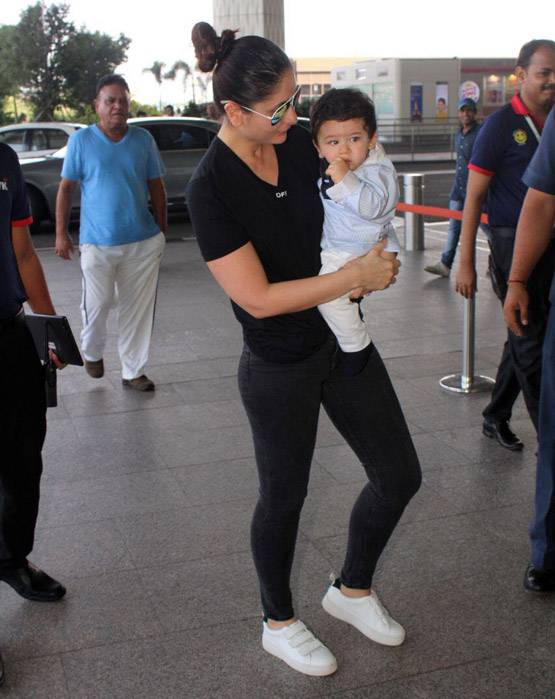 MOMMY करीना की गोद में खेलते दिखे तैमूर, PHOTOS वायरल