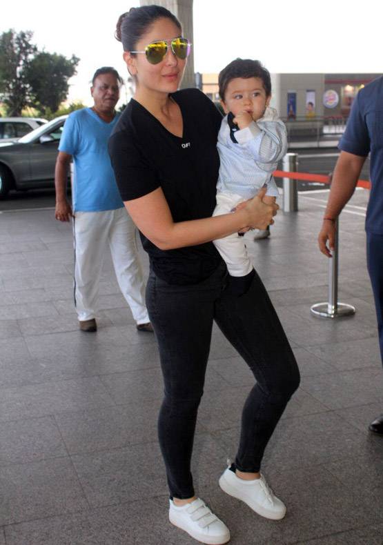 MOMMY करीना की गोद में खेलते दिखे तैमूर, PHOTOS वायरल