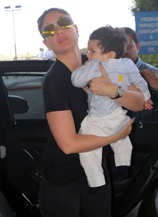 MOMMY करीना की गोद में खेलते दिखे तैमूर, PHOTOS वायरल