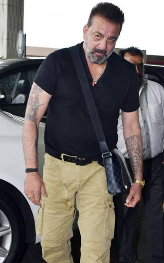 ये हैं संजू के रियल 'कमली', एयरपोर्ट पर संजय दत्त के साथ दिखे