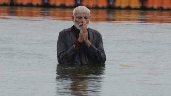 काले कपड़ों में कुंभ स्नान, मोदी की डुबकी पर क्या कहते हैं विद्वान