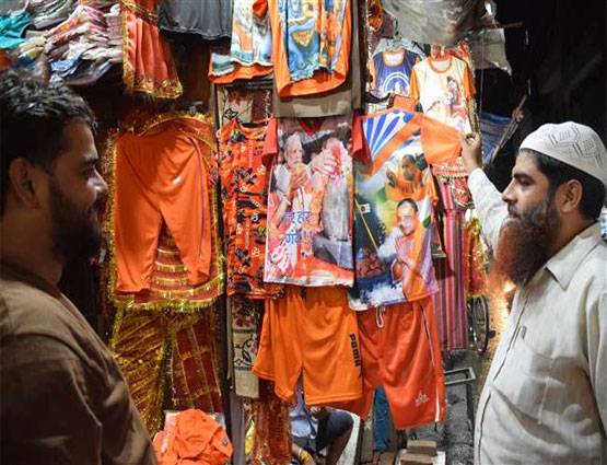 सावन: शिव भक्त कांवड़ियों में मोदी-योगी टी-शर्ट की धूम