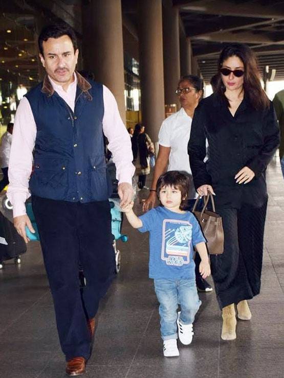 लंदन से छुट्टियां मना कर लौटे सैफ-करीना, ब्लू आउटफिट में दिखे तैमूर