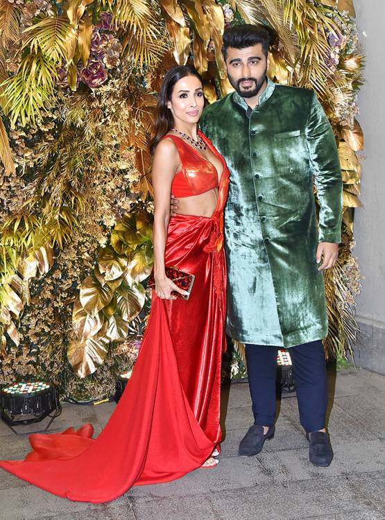 अर्जुन कपूर का हाथ थामे रिसेप्शन में पहुंचीं मलाइका, PHOTOS