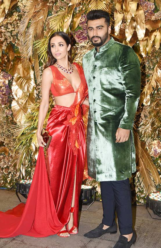 अर्जुन कपूर का हाथ थामे रिसेप्शन में पहुंचीं मलाइका, PHOTOS