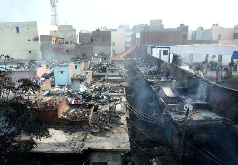 दर्द के निशान, जले हुए मकान, देखें दिल्ली हिंसा के बाद की तस्वीरें