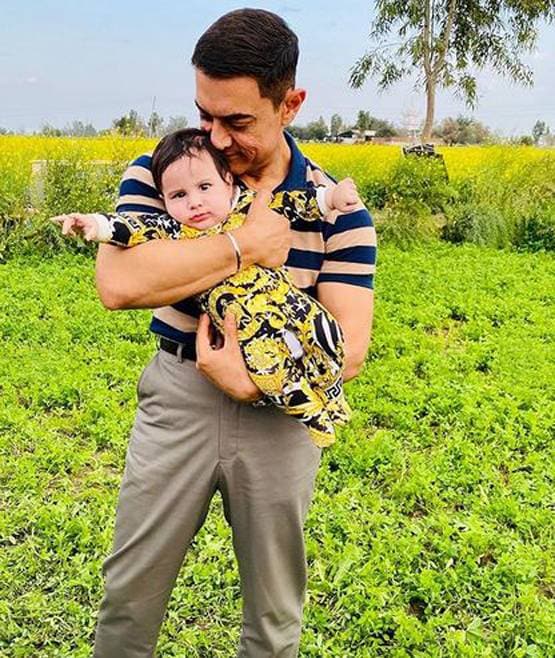 शूटिंग सेट पर नन्हें बच्चे के साथ दिखे आमिर खान, किसका है ये बेटा?