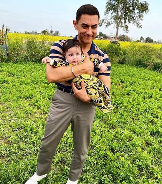 शूटिंग सेट पर नन्हें बच्चे के साथ दिखे आमिर खान, किसका है ये बेटा?