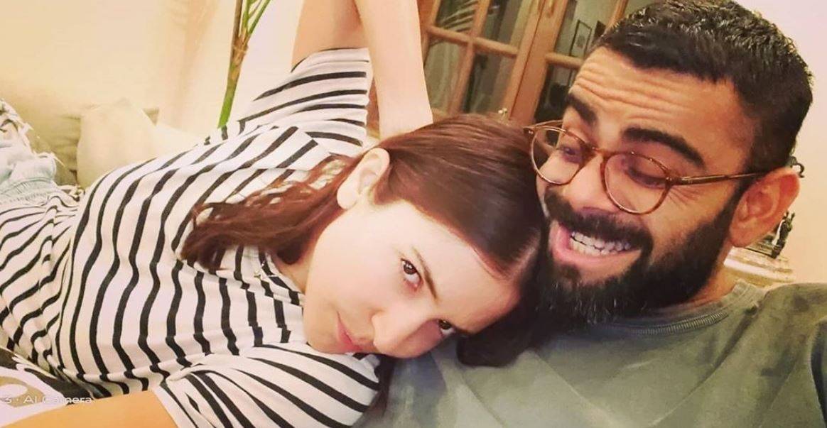 फोटो शेयर कर बोले विराट-अनुष्का, स्माइल फेक होगी लेकिन हम नहीं
