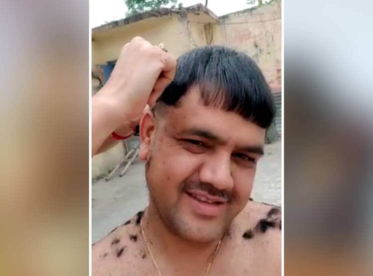 इंस्पेक्टर की पत्नी ने काटे पति के बाल, सोशल मीडिया पर वीडियो हुआ वायरल