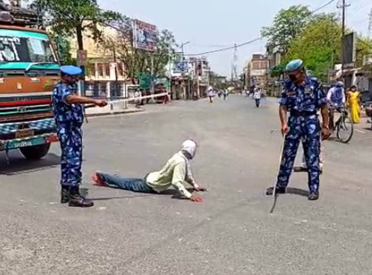 लॉकडाउन में तोड़ा नियम तो बनाया 'मगरमच्छ', तपती सड़क पर 'तैरने' की सजा