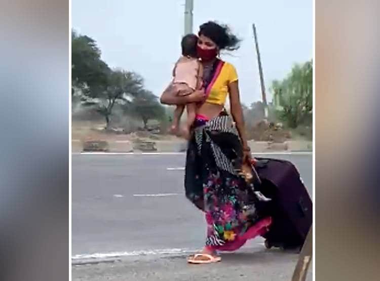 एक हाथ में मासूम, दूसरे में सूटकेस, पैदल किया 1 हजार किमी का सफर